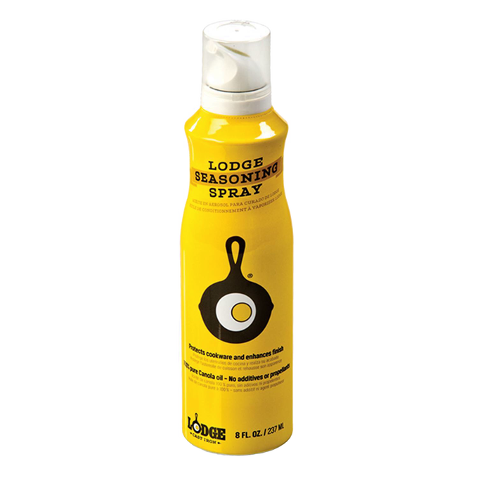 Yellow can of cooking spray with black cast iron skillet and fried egg graphic, designed to protect and enhance seasoned cookware, suitable for Kitchen & Food, Cookware, Cast Iron collections.