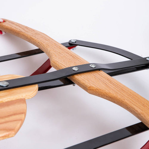 Close-up of a handcrafted Amish made sled frame featuring smoothly sanded solid oak wood and durable black metal hardware, perfect for outdoor play in Toys, Books & Games and USA Made collections.