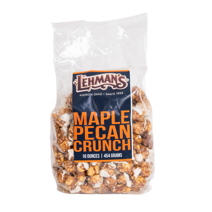 Clear bag of handcrafted caramel corn coated with maple and pecan flavors, a unique sweet snack made in USA, featured in Kitchen & Food, Snacks and Sweets, Popcorn, and Best Sellers collections.