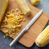 Handcrafted Rada Steak/Utility Knife with solid satin-finished recycled aluminum handle and surgical quality stainless steel blade, ideal for food prep in kitchen and farm collections.