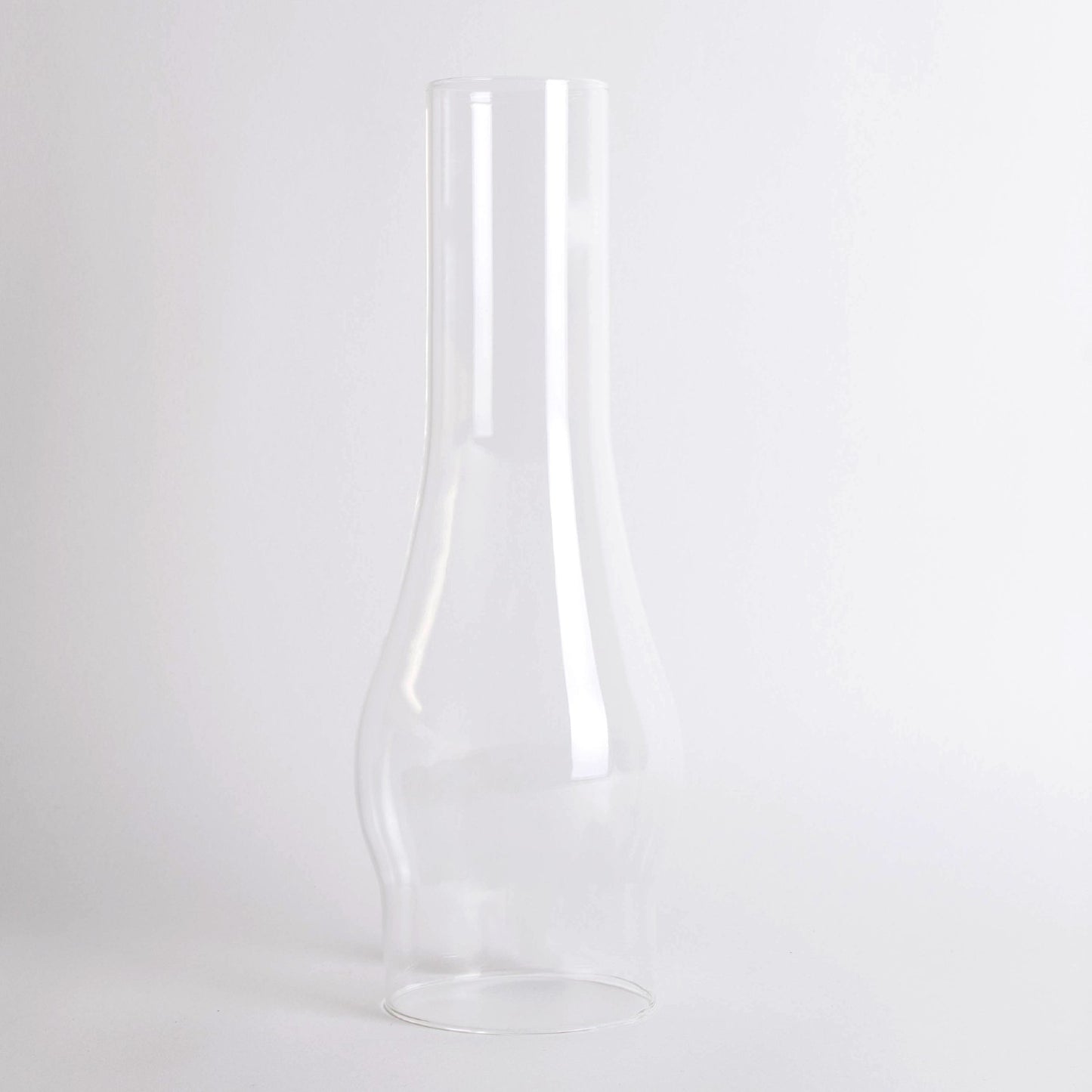 Clear glass oil lamp chimney with a 3-inch base, handcrafted for durability, perfect for Lamps & Lighting, Parts and Accessories, Chimneys and Globes, Best Sellers, and Promo Eligible collections.