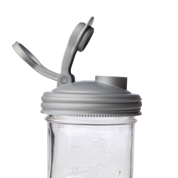 Gray wide-mouth pour lid with flip-top spout and carry loop, crafted from durable no-break plastic, designed for mason jars, featured in Kitchen & Food, Kitchen Gadgets, USA Made, and Best Sellers collections.