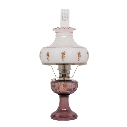 Handcrafted Aladdin glass oil lamp featuring a purple Lincoln Drape base, delicate rose-accented white glass shade with scalloped edge, clear chimney, and polished brass burner, ideal for Farm, Garden & Tool, Lamps & Lighting, Oil Lamps, Table Lamps, Best Sellers, Homesteading, and Promo Eligible collections.