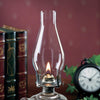Clear glass oil lamp chimney with a 2-5/8" base, designed for replacement use in lamps, featured in Lamps & Lighting, Parts and Accessories, Chimneys and Globes, and Best Sellers collections.