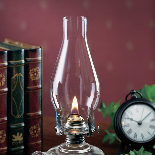 Clear glass oil lamp chimney with a 2-5/8" base, designed for replacement use in lamps, featured in Lamps & Lighting, Parts and Accessories, Chimneys and Globes, and Best Sellers collections.