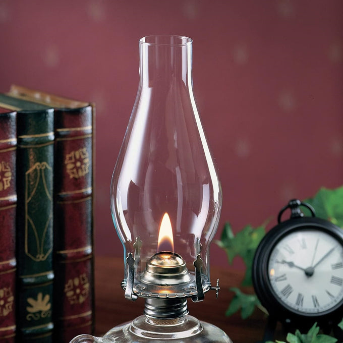 Clear glass oil lamp chimney with a 2-5/8" base, designed for replacement use in lamps, featured in Lamps & Lighting, Parts and Accessories, Chimneys and Globes, and Best Sellers collections.