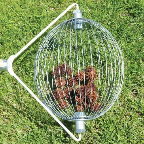 Handcrafted metal nut gathering tool with wooden handle holding spiky seed pods, designed for easy yard cleanup without bending; featured in Farm, Garden & Tool, Lawncare, Best Sellers, Promo Eligible collections.