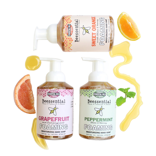 Three 16 fl oz pump bottles of handcrafted Beessential Natural Foaming Hand Soap in sweet orange, grapefruit with lemongrass, and peppermint with aloe and honey, made in small batches in the USA, ideal for Health & Wellness, Soaps, USA Made, and Best Sellers collections.