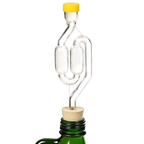 Clear glass S-shaped airlock with yellow cap and cork stopper set in a green bottle neck, designed for fermenting in kitchen, food preservation, and fermenting collections.