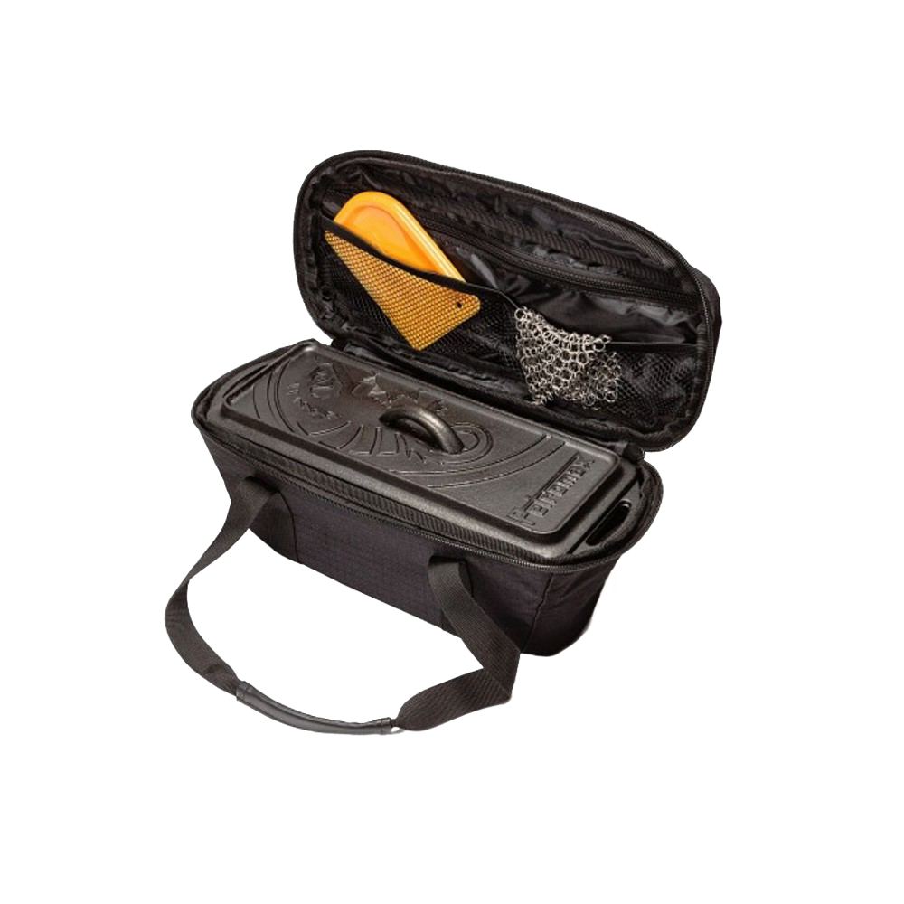 Black transport bag with sturdy handles holding a cast iron loaf pan and baking accessories, designed for secure storage and travel, ideal for camping, bread making, and farm tools.