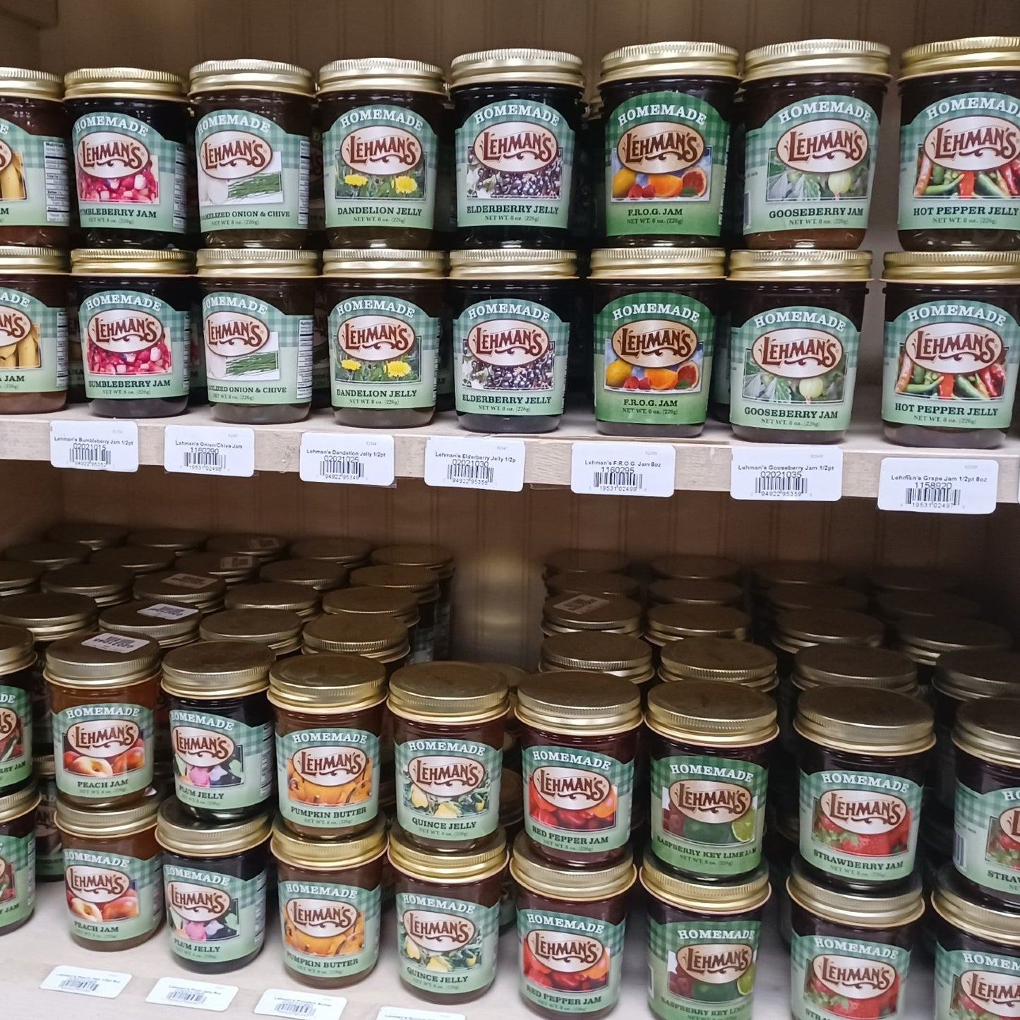 Shelves displaying a variety of handcrafted Lehman's jams, jellies, and fruit butters made in USA with all-natural ingredients, suitable for Kitchen & Food, Pantry, and Best Sellers collections.