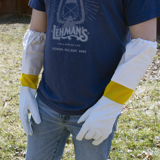 Long protective beekeeping gloves made from smooth goatskin with durable yellow vented fabric sleeves and elastic cuffs, offering dexterity and safety in farm, garden, and tool collections.