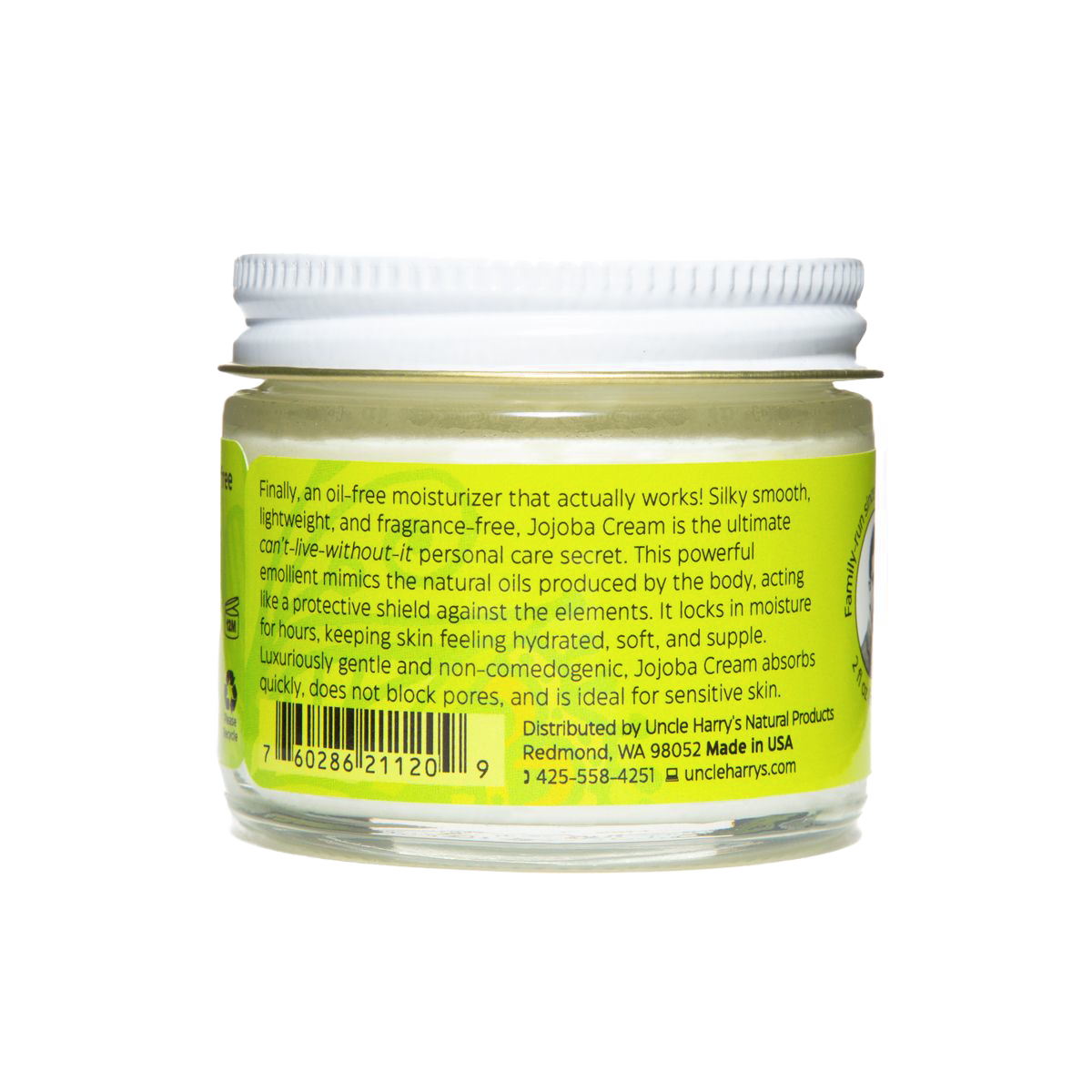 Clear glass jar with white lid showing green product label for Uncle Harry's Jojoba Cream Oil-Free Moisturizer, highlighting gentle, fast-absorbing formula ideal for sensitive skin, made in USA, featured in Health & Wellness and Balms, Creams and Lotions collections.