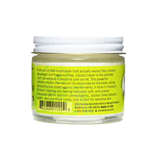 Clear glass jar with white lid showing green product label for Uncle Harry's Jojoba Cream Oil-Free Moisturizer, highlighting gentle, fast-absorbing formula ideal for sensitive skin, made in USA, featured in Health & Wellness and Balms, Creams and Lotions collections.