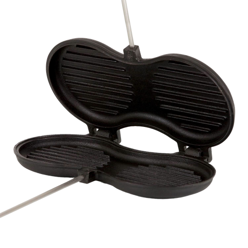 Cast iron burger iron with hinged round ridged molds designed for searing patties over an open flame, ideal for outdoor cooking and camping cookware collections.