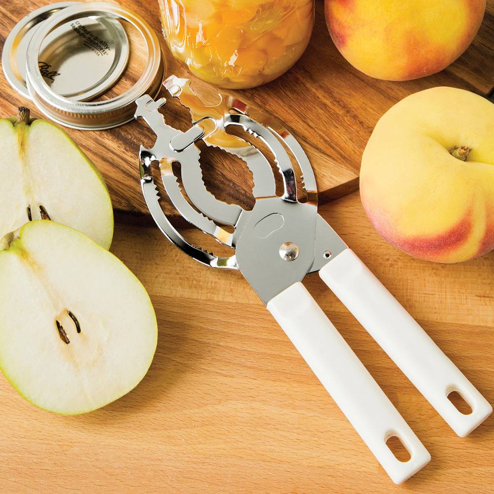 Chrome steel jar and bottle opener with white handles, shown with fruit preserves and fresh peaches and pears, designed for Kitchen & Food, Kitchen Gadgets, and Best Sellers collections.