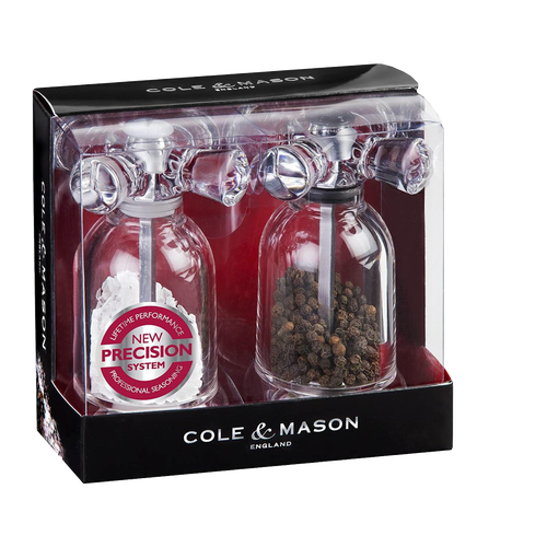 Clear acrylic salt and pepper mills styled like vintage faucets, filled with sea salt and black peppercorns, ideal for Kitchen & Food, Dinnerware, Storage and Serving, Best Sellers, and Promo Eligible collections.