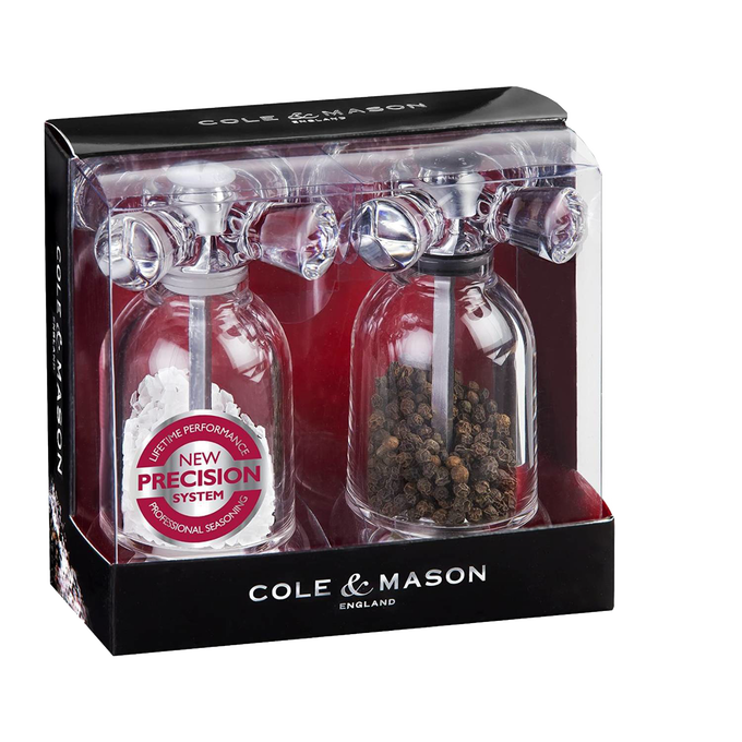 Clear acrylic salt and pepper mills styled like vintage faucets, filled with sea salt and black peppercorns, ideal for Kitchen & Food, Dinnerware, Storage and Serving, Best Sellers, and Promo Eligible collections.