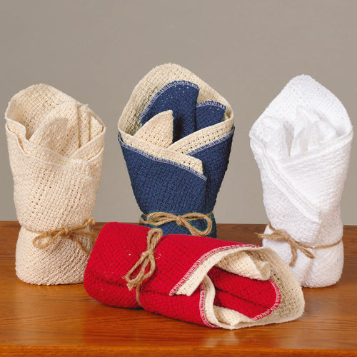 Set of four pre-shrunk cotton dishcloths in red, navy blue, natural, and white, tied with twine and featured in Kitchen & Food, Kitchen Textiles, USA Made, and Best Sellers collections.