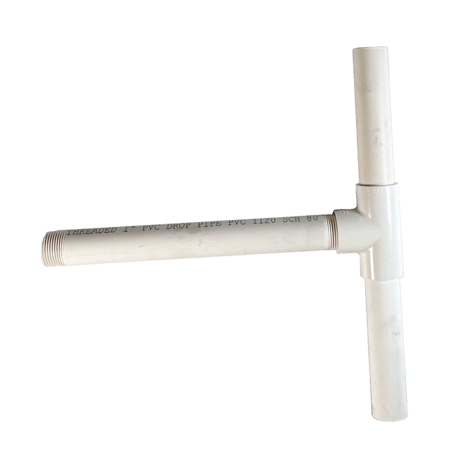 Durable white PVC pitless pump head assembly with threaded fittings, designed for use in deep well water pumps, featuring lower height for compact installation and made in USA quality.