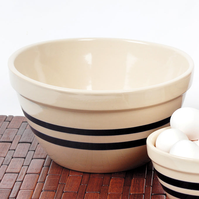 Handcrafted USA-made stoneware shoulder bowls with classic black stripes, durable and ideal for mixing, baking, and serving, featured in Kitchen & Food, Cookware, and Baking Supplies collections.