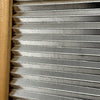 Close-up of a handcrafted galvanized wavy scrubbing surface with a smooth wooden frame, part of a miniature washboard ideal for Home & Decor, Laundry Supplies, and USA Made collections.