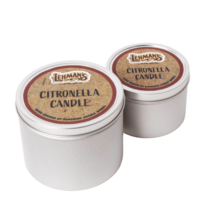Two handcrafted citronella candles in compact metal tins with branded brown labels, designed for outdoor use in camping, pest control, and garden lighting collections.