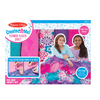 Boxed no-sew craft kit featuring colorful, super-thick fleece pieces to create a large handmade flower quilt, promoting creativity in children's arts and crafts collections.