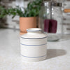 Handcrafted ceramic butter crock with minimalist blue band accents, designed for soft butter storage without refrigeration, ideal for Farm, Garden & Tool and Kitchen & Food collections.