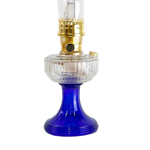 Handcrafted vintage-style oil lamp featuring a clear glass font with cobalt blue base and brass trim, ideal for Lamps & Lighting, Oil Lamps, Table Lamps, and Best Sellers collections.