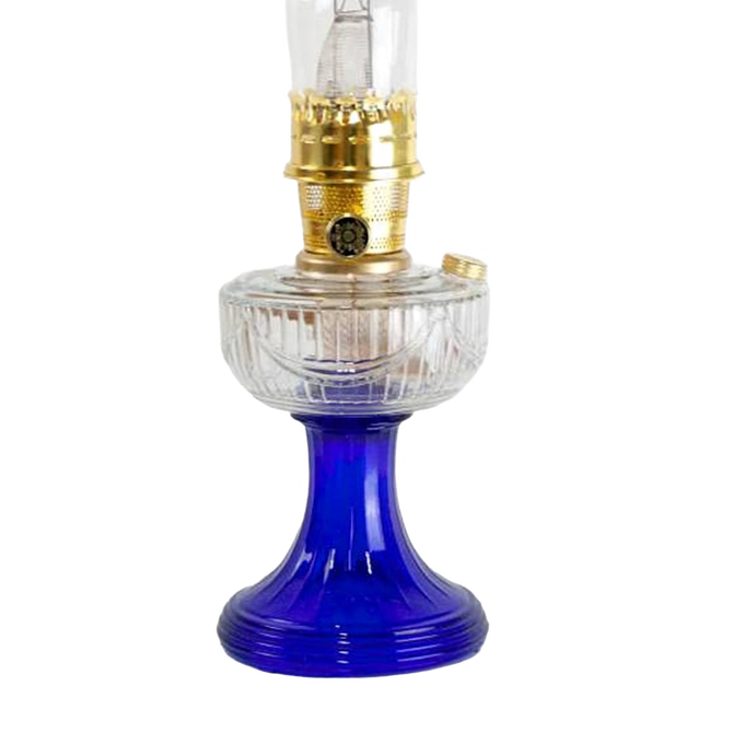 Handcrafted vintage-style oil lamp featuring a clear glass font with cobalt blue base and brass trim, ideal for Lamps & Lighting, Oil Lamps, Table Lamps, and Best Sellers collections.