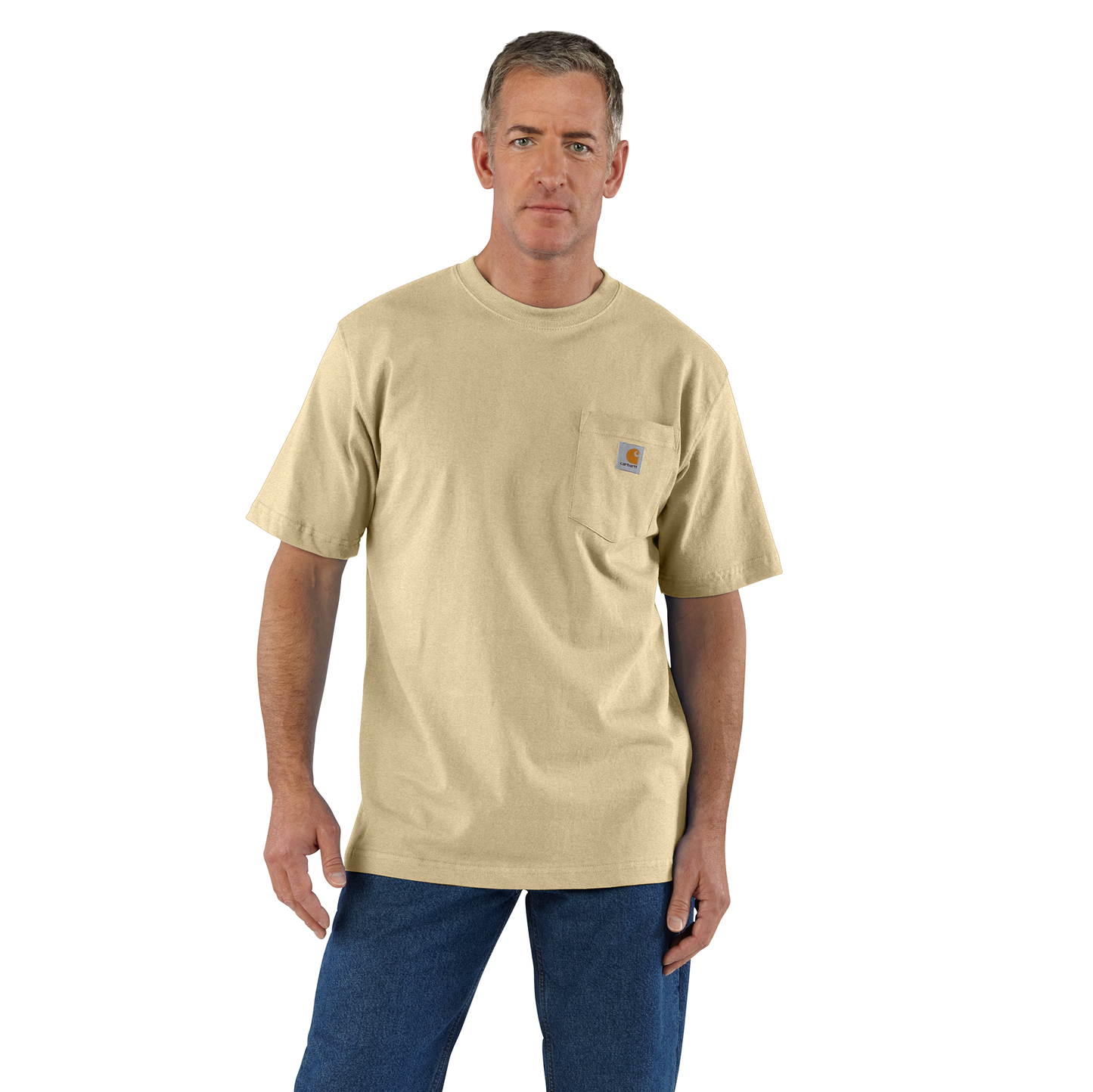Man wearing a heavyweight beige short-sleeve crewneck pocket t-shirt with rib-knit collar and side-seam construction, styled casually with blue jeans, featured in Clothing and Accessories and Best Sellers collections.