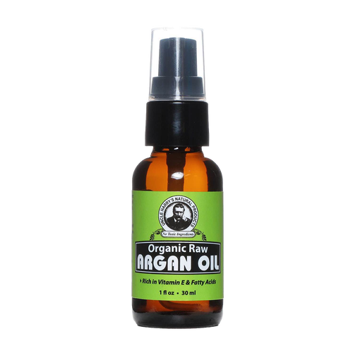 Handcrafted amber glass bottle of organic raw argan oil with black pump and clear cap, rich in vitamin E and fatty acids, part of Health & Wellness, Grooming and Personal Hygiene, USA Made, and Best Sellers collections.