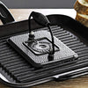 Seasoned cast iron rectangular grill press with heat-retaining surface and spring handle, designed for searing paninis and speeding cooking on grill or stovetop, ideal for Kitchen & Food and Cast Iron cookware collections.