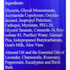 Close-up of the ingredients list on a bottle of Two Old Goats Essential Oil Lotion, highlighting natural components like goat's milk, aloe vera, almond oil, and therapeutic essential oils, featured in Health & Wellness and USA Made collections.