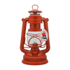 Bright red galvanized oil lantern with a clear heat-resistant glass globe, designed for reliable outdoor lighting in camping, emergency, and barn settings, featured in best sellers and promo collections.