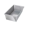 Large nonstick loaf pan made of durable aluminized steel with corrugated texture for warp resistance and even baking, handcrafted and made in USA for Kitchen & Food and Baking Supplies collections.