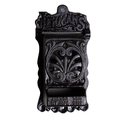 Handcrafted black cast iron wall-mounted matchbox holder with vintage decorative design and Lehman's branding, made in USA, featured in Home & Decor, Household Helpers, and Best Sellers collections.