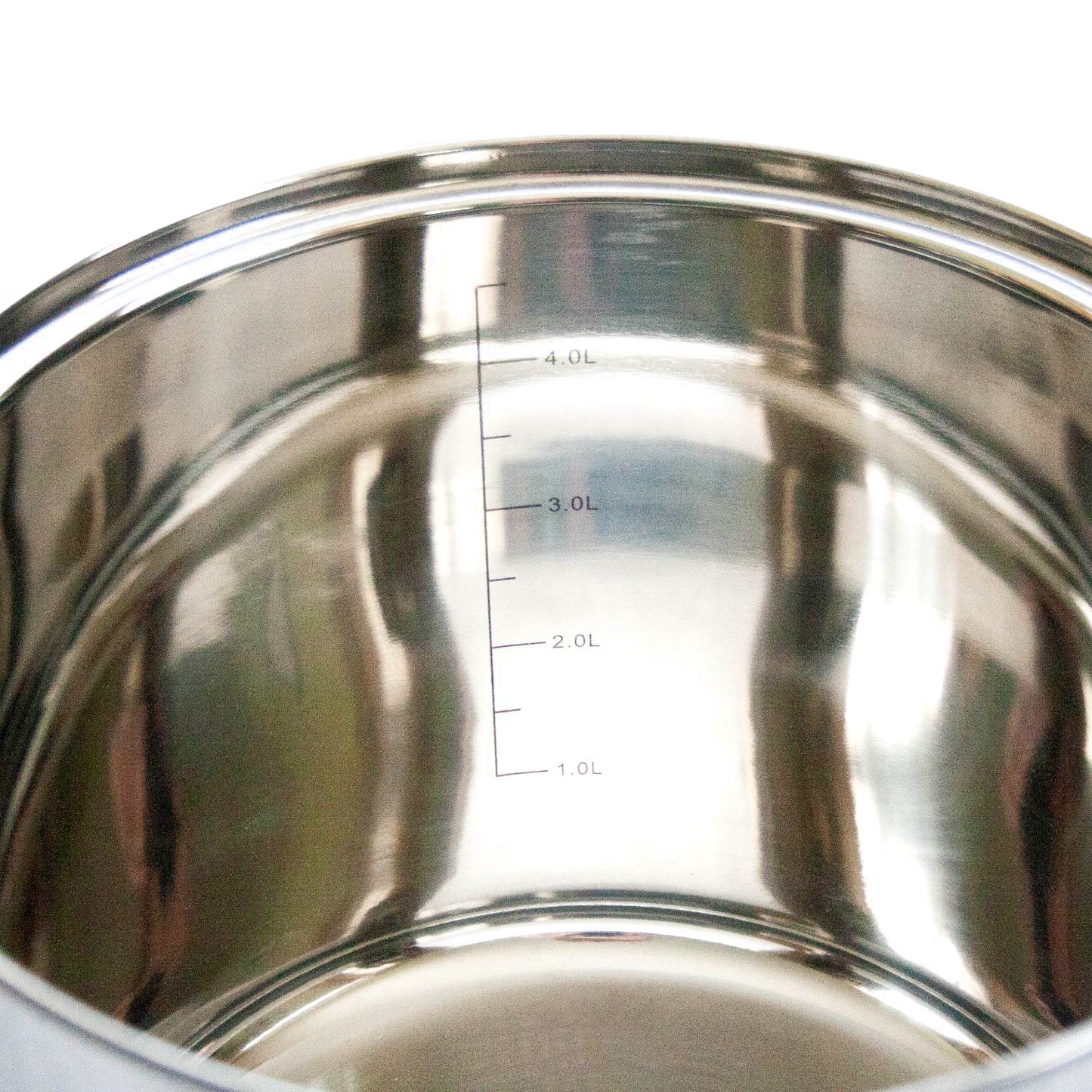 Close-up of the interior of a shiny stainless steel pot with volume markings from 1.0L to 4.0L, ideal for kitchen and cookware collections.