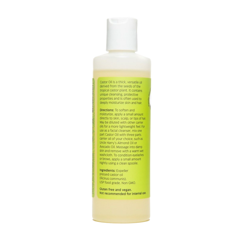 Plastic bottle of Uncle Harry's Castor Oil featuring a yellow label with usage directions and ingredients, part of Health & Wellness and Grooming collections, made in USA