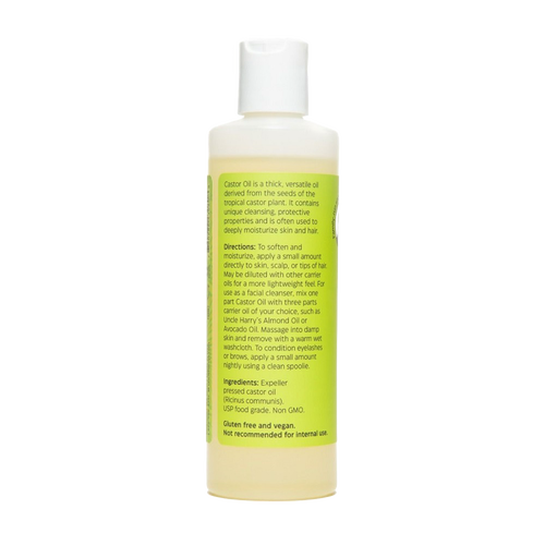 Plastic bottle of Uncle Harry's Castor Oil featuring a yellow label with usage directions and ingredients, part of Health & Wellness and Grooming collections, made in USA