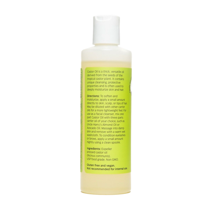 Plastic bottle of Uncle Harry's Castor Oil featuring a yellow label with usage directions and ingredients, part of Health & Wellness and Grooming collections, made in USA