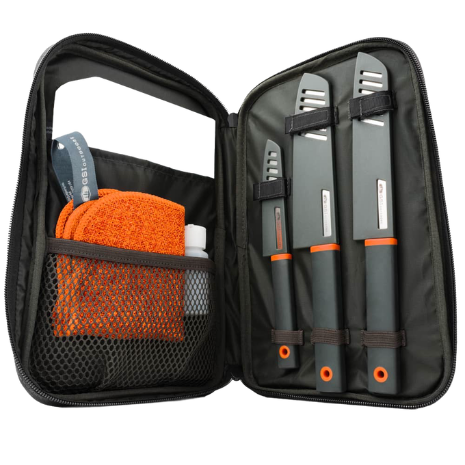 Compact camping knife set with three stainless blades secured in a black zippered case, including an orange and white cleaning cloth and soap bottle, designed for outdoor use.