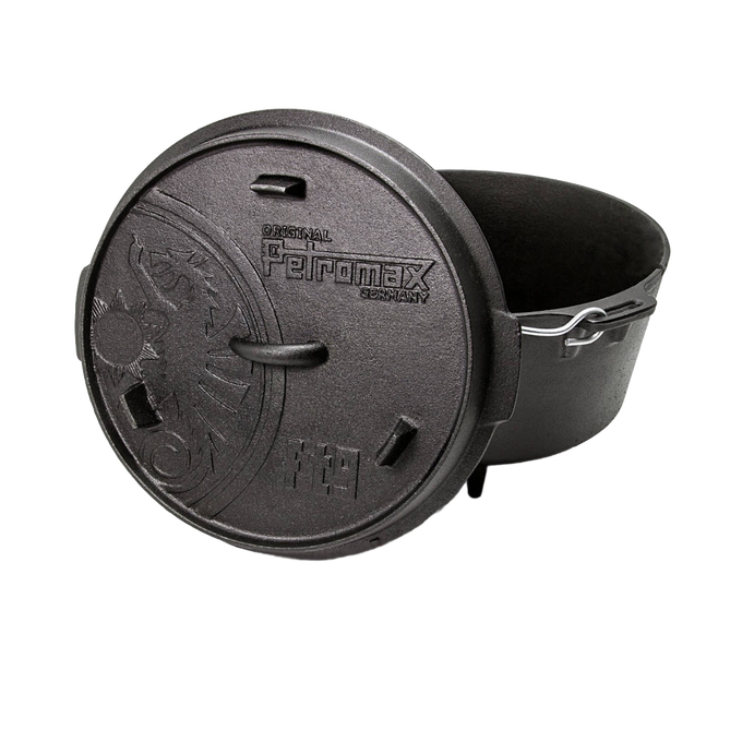 Open cast iron Dutch oven with legs featuring a decorative embossed lid and sturdy wire bail handle, designed for versatile use in Kitchen & Food, Cookware, Cast Iron, Best Sellers, Promo Eligible collections.