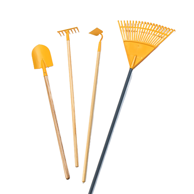 Set of durable, child-sized yellow gardening tools including a shovel, rake, hoe, and leaf rake, designed for outdoor play and children's gardening activities.