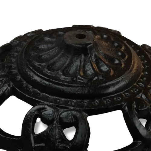 Close-up of a sturdy cast iron bowl with decorative detailing and central hole, handcrafted for lamps and lighting parts, featured in best sellers and promo eligible collections.
