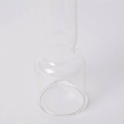 Clear replacement chimney made of heat-resistant glass for oil lamps, featured in Lamps & Lighting, Oil Lamps, Table Lamps, Best Sellers, and Promo Eligible collections.