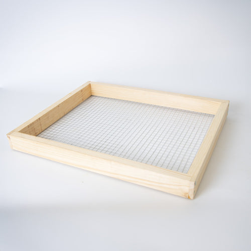 Handcrafted wooden frame with metal grid, designed as a durable candy board feeder for beekeeping, Amish made in the USA, part of farm, garden, and beekeeping supplies.