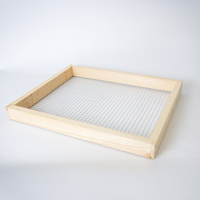 Handcrafted wooden frame with metal grid, designed as a durable candy board feeder for beekeeping, Amish made in the USA, part of farm, garden, and beekeeping supplies.