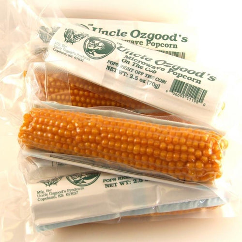 Clear plastic bags each containing a single corn cob designed for microwave popping, labeled with product information, part of Kitchen & Food, Snacks and Sweets, Popcorn, USA Made, and Best Sellers collections.